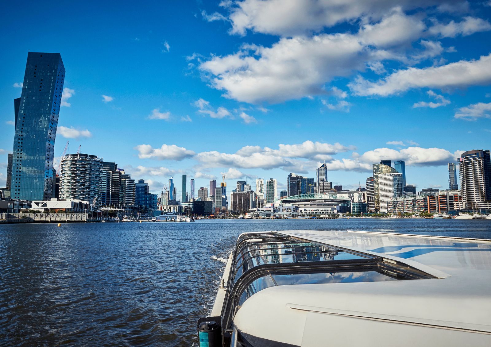 Docklands and the Melbourne skyline seen over the bow of the ferry